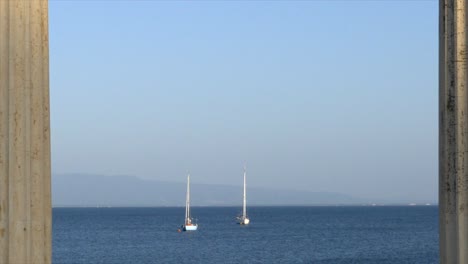 Two-boats-moored-in-front-of-Tharros-in-Sardinia