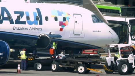 Unloading-the-luggage-from-a-Boeing-A320-Neo-owned-by-Brazil's-Azul-Linhas