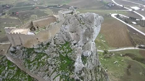 Drone-shot-flying-backward-from-the-Mussomeli-Castle-in-Sicily