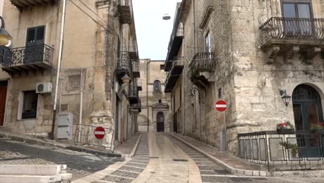 Central-square-buildings-in-Mussomeli,-the-town-in-Sicily-where-houses-are-for-sale-at-1-Euro