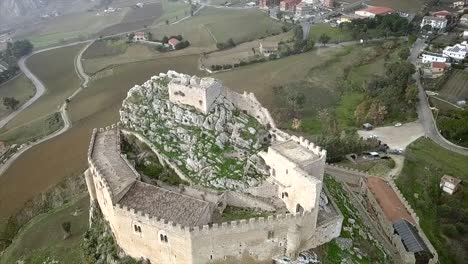 Drone-shot-going-down-and-tilting-of-the-Mussomeli-Castle-in-Sicily