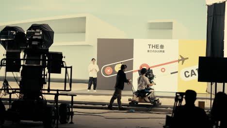 Behind-the-Scenes-of-Film-Crew-Using-Dolly-on-Track-on-Production-Set