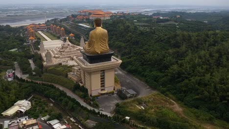 Drone-aerial-right-rotating-flying-view-of-Fo-Guang-Shan-golden-Buddha-statue-Museum-complex