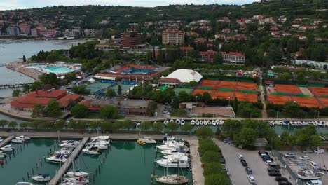 Drone-aerial-left-rotating-flying-view-of-Portoroz-before-ATP-Challenger-Slovenia-Open-tennis