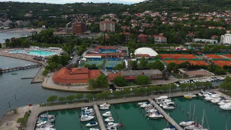 Drone-aeria-fastl-left-rotating-flying-view-of-Portoroz-before-ATP-Challenger-Slovenia-Open-tennis