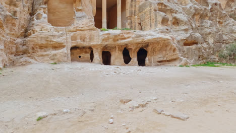Revealing-shot-of-the-ruins-of-a-building-carved-in-sandstone-in-Petra