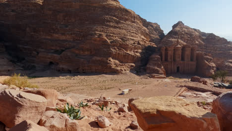 Cinematic-establishing-shot-of-ruins-of-The-Monastery-in-Petra-Jordan