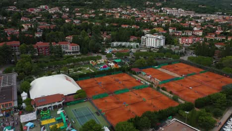 Drone-aerial-forward-flying-view-of-Portoroz-ATP-Challenger-Slovenia-Open-tennis-grounds
