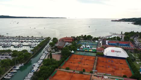 Drone-aerial-forward-flying-toward-sea-from-Portoroz---ATP-Challenger-Slovenia-Open-tennis-grounds