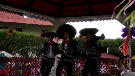 slow-motion-shot-of-mariachi-and-dancers