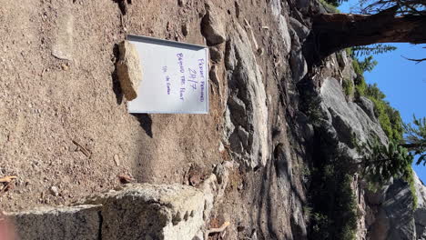 Vertical-Shot-Of-Permit-Required-24-7-Beyond-This-Point-Sign-At-The-Entrance-Of-Sub-Dome-Hiking-Trail-In-Yosemite,-California