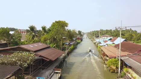 Boat-Sailing-Out-From-Famous-Amphawa-Floating-Market-River-Canal,-Thailand