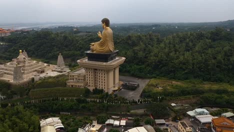Drone-aerial-right-rotating-flying-view-of-Fo-Guang-Shan-golden-Buddha-statue-Museum-complex