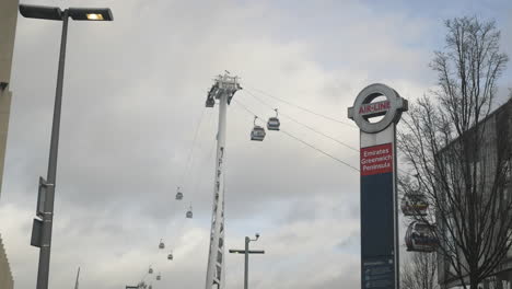 Still-shot-of-London-air-line-cable-car-suspended-carriage-station-Greenwich