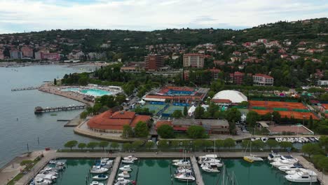 Drone-aerial-forward-flying-view-of-Portoroz-before-ATP-Challenger-Slovenia-Open-tennis