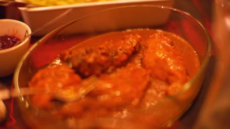 Close-up-of-steaming-rabbit-being-served-at-Christmas-traditional-dinner