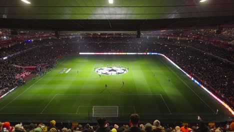 Champions-League-night,-Emirates-Stadium,-flashing-lights-cover-the-iconic-venue
