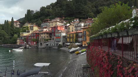 People-Walk-near-Beautiful-Villas-of-Varenna-Town-near-Lake-Como-in-the-Early-Autumn-Morning