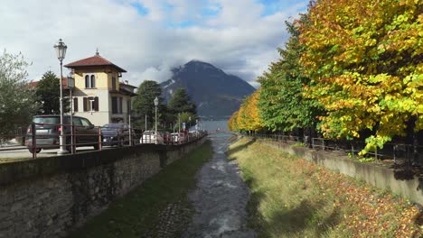 Couple-Standing-on-the-Bridge-in-Town-of-Varenna-in-Lake-Como