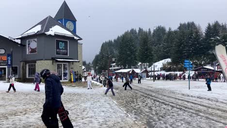 Skiers-and-tourists-stroll-through-the-stores-of-Cerro-Catedral-Village