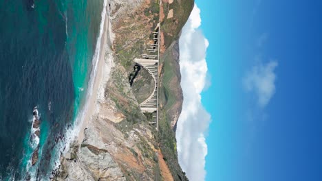 An-aerial-view-of-the-iconic-Bixby-Bridge-along-highway-101-near-Big-Sur,-California