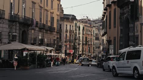 Naples-street-scene-with-cafes,-Italy