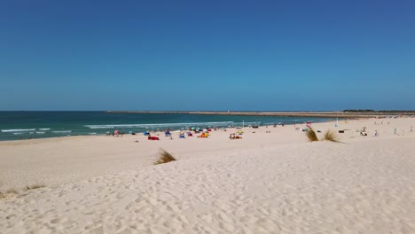 Panoramic-view-of-the-idyllic-Praira-da-Barra-beach-from-Gafanha-da-Nazaré,-Portugal