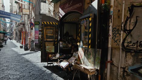 Quaint-Naples-alley-with-vintage-shop,-Italy