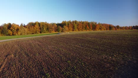 Fall-Colors-Across-Agricultural-Field-In-Rural-Village-Of-Bohucovice,-Czechia