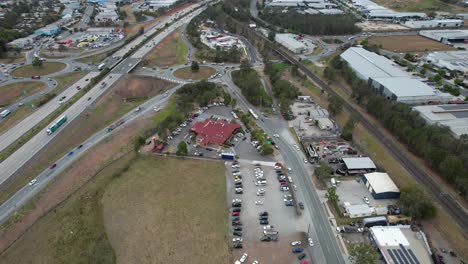 View-from-Above-Of-Famous-Pie-Store-Near-Pacific-Motorway-In-Yatala,-Gold-Coast,-Queensland