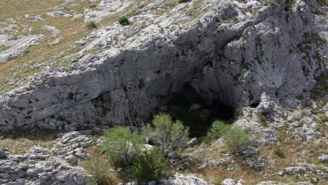 Aerial-view-of-cave-in-a-field