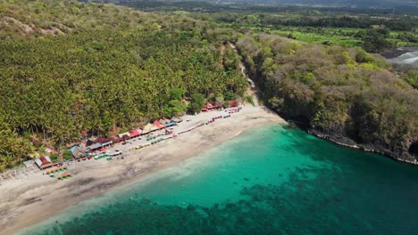 Virgin-Beach-with-transparent-green-sea-waters-in-East-Bali,-Karangasem,-Indonesia