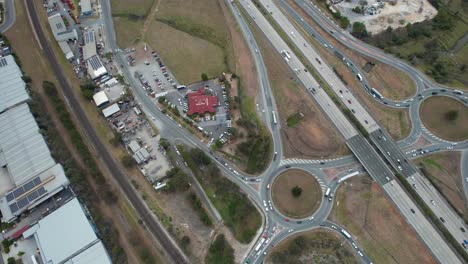 Busy-Motorway-And-Roundabout-In-The-Suburb-Of-Yatala-In-Gold-Coast,-Queensland