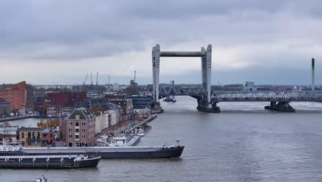 Railway-bridge,-Dordrecht-city,-striking-structure-that-spans-river-water