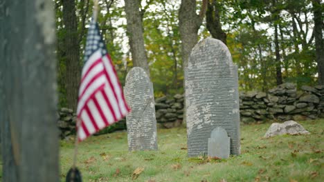 Honor-the-past-with-this-stock-video-featuring-an-American-flag-gently-waving-in-an-old-cemetery-from-the-1800s