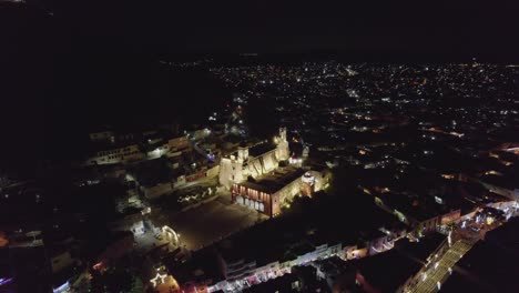 Aerial-shot-at-the-night-of-the-Ex-convent-of-San-Francisco-in-Atlixco-Puebla