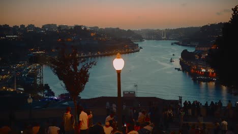 Crowd-of-Tourist-Enjoying-Beautiful-Italian-Sunset-at-Scenic-Landmark-at-Docks