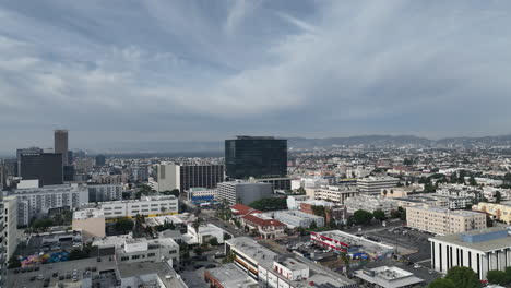 Flying-a-drone-in-Koreatown,-view-of-the-urban-sprawl-in-Los-Angeles