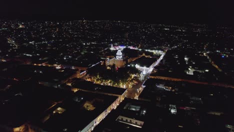 Downtown-Atlixco-Puebla-illuminated-with-Christmas-lights-aerial-shot