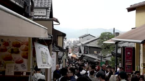 Busy-Crowds-Along-Street-Leading-To-Overtourism-At-Kiyomizu-dera-In-Kyoto