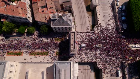 Aerial-Bird's-eye-view-of-Montpellier-Pride-March,-France