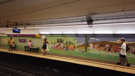 Establishing-Shot-of-Subway-Underground-Station-with-Artwork-of-Jujuy-Native-Art-Culture,-Line-E-of-Subte