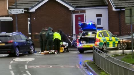 Police-and-ambulance-investigation-and-first-aid-on-injured-car-accident-pedestrian