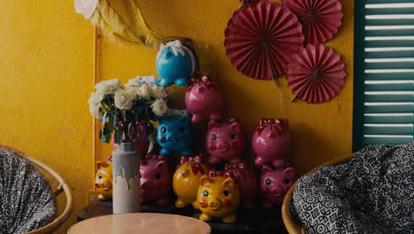 Colorful-Piggy-banks-and-decor-inside-coffee-shop