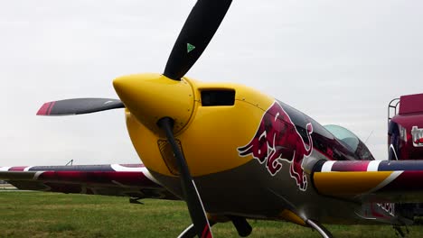 Close-up-of-parked-aerobatic-plane-exterior-design-and-front-propeller