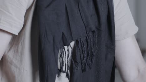 Muslim-woman-ironing-clothing---tilt-up-reveal