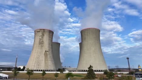 Aerial-approach-toward-nuclear-power-plant-cooling-towers-while-emit-vapor