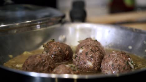 cooking-down-beyond-meatballs-in-pan-Preparing-ingredients-to-make-vegan-beyond-meatballs-with-spaghetti-and-meat-sauce