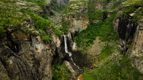 Waterfalls-Of-Hellmojuvet-Canyon-Steep-Rocky-Cliffs-In-Northern-Norway
