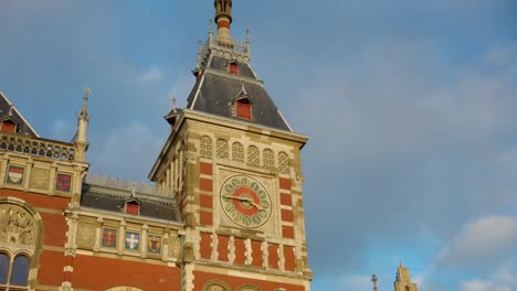 Tilt-Up-View-Of-Amsterdam-Central-Facade-To-Reveal-Clock-Face